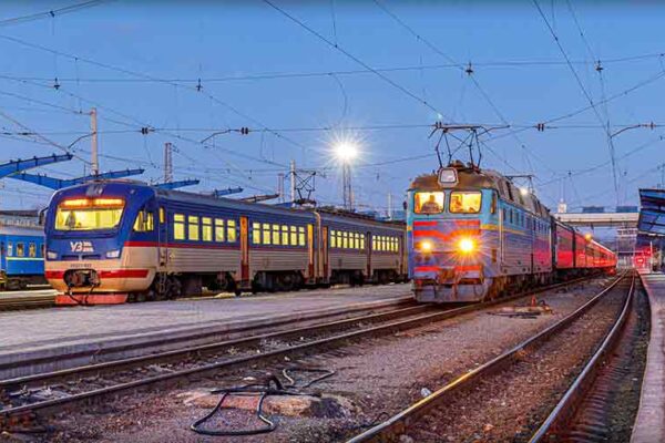 Two trains stand at the platform of the railway station in Dnepropetrovsk, Ukraine, earlier this year. shutterstock.com/ZagAlex