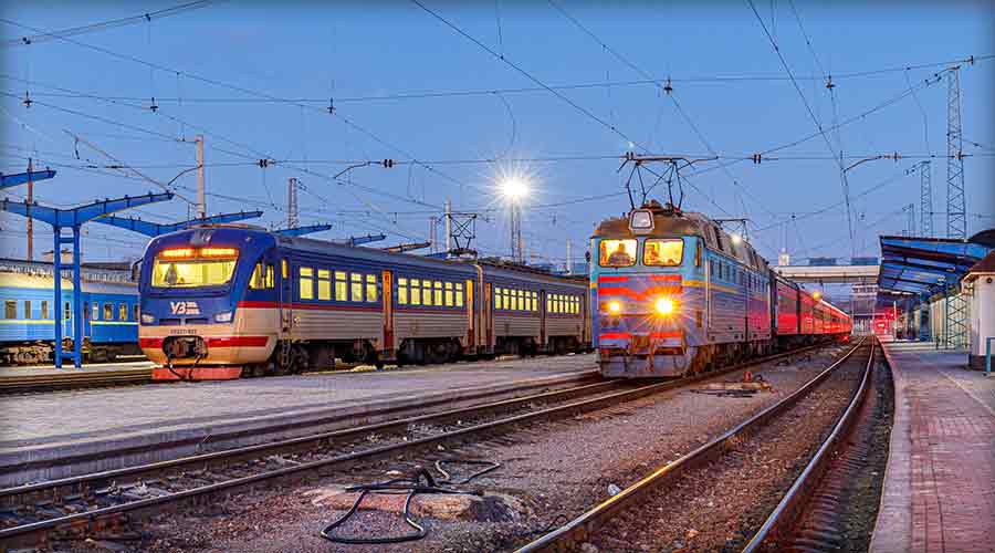 Two trains stand at the platform of the railway station in Dnepropetrovsk, Ukraine, earlier this year. shutterstock.com/ZagAlex